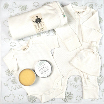 Organic cotton pointelle growsuit, beanie, bodysuit and baby blanket