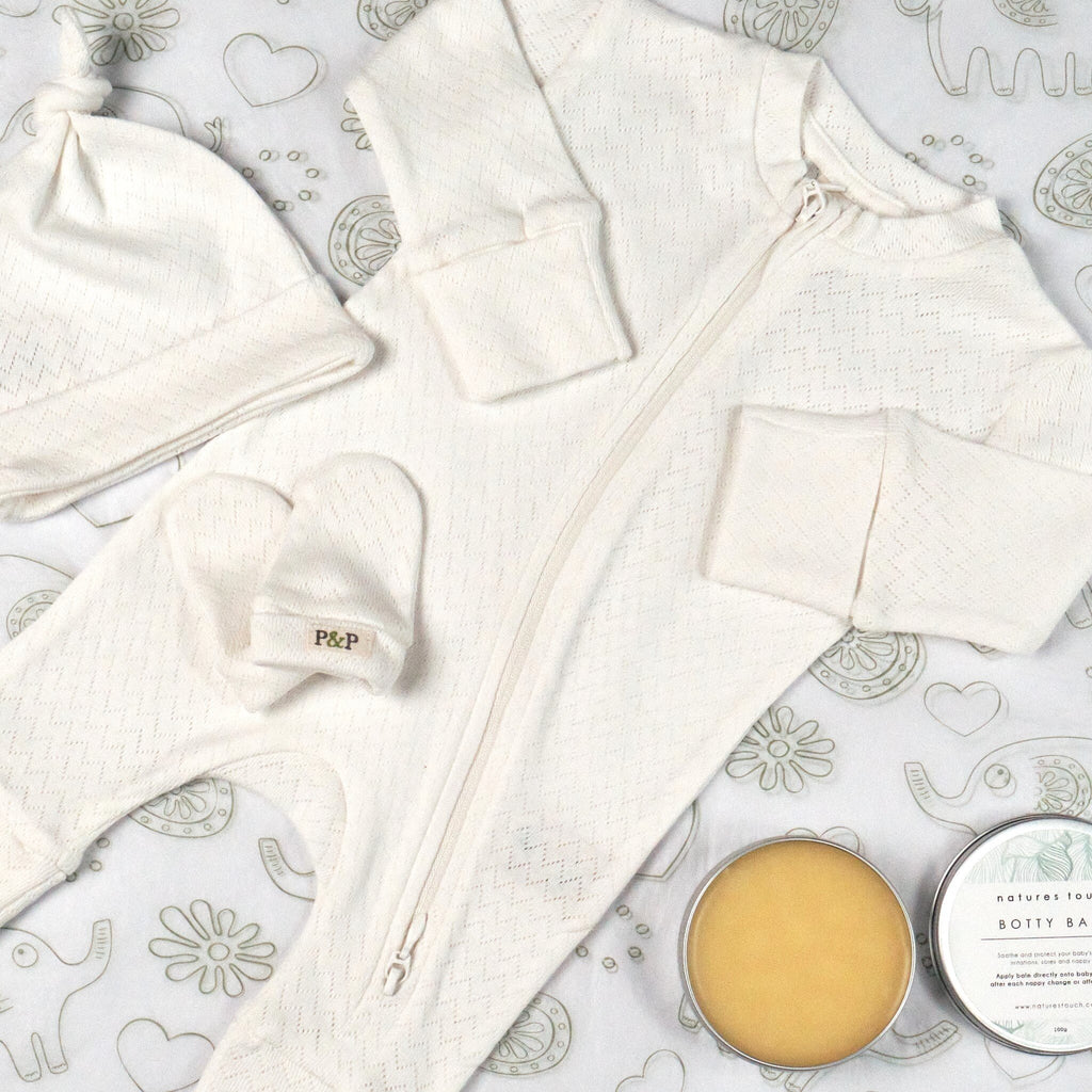 Organic cotton pointelle growsuit, beanie, mittens, card and botty balm