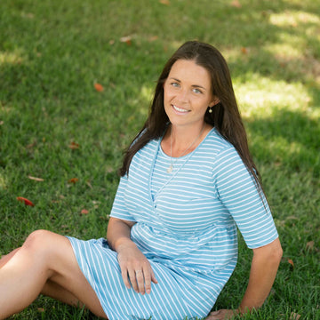Woman wearing an organic Cotton Turquoise Blue Maternity Dress